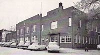 Factory and main office of the Lansing Company are in this downtown building.