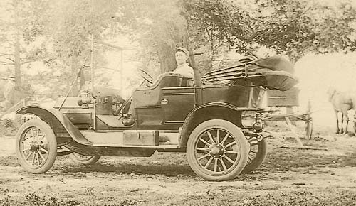 Herman Hamann and his
                  new Buick