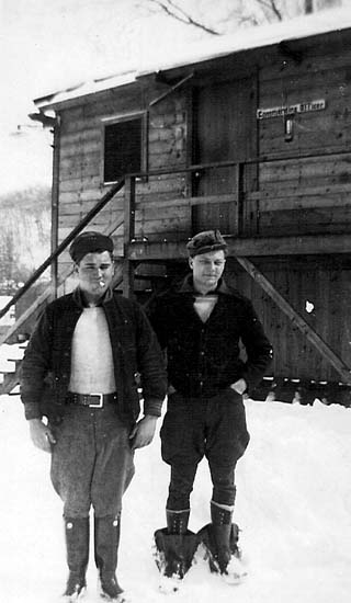 In front of Commanding Officers office. R.H. Radloff on the left.