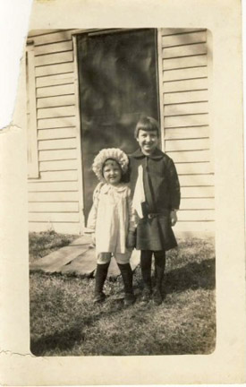 Two girls by door